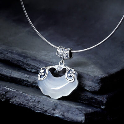Sterling Silver Red Eye Double Fish Lock Pendant