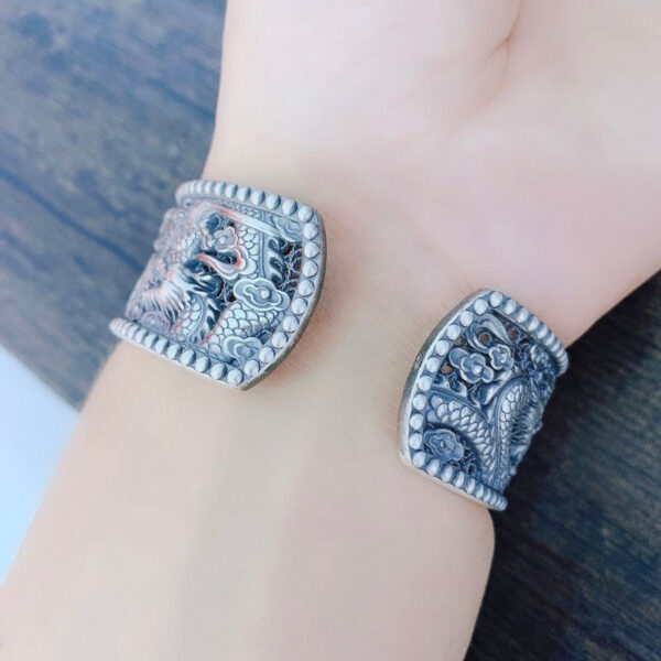 DoubleDragonsPlayingwithBeadshollowoutBracelet-SterlingSilver.jpg