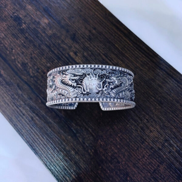 DoubleDragonsPlayingwithBeadshollowoutOpenBracelet-Silver.jpg