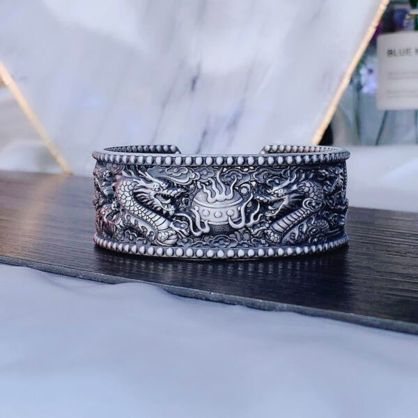 DoubleDragonsPlayingwithBeadshollowoutOpenBracelet-SterlingSilver.jpg