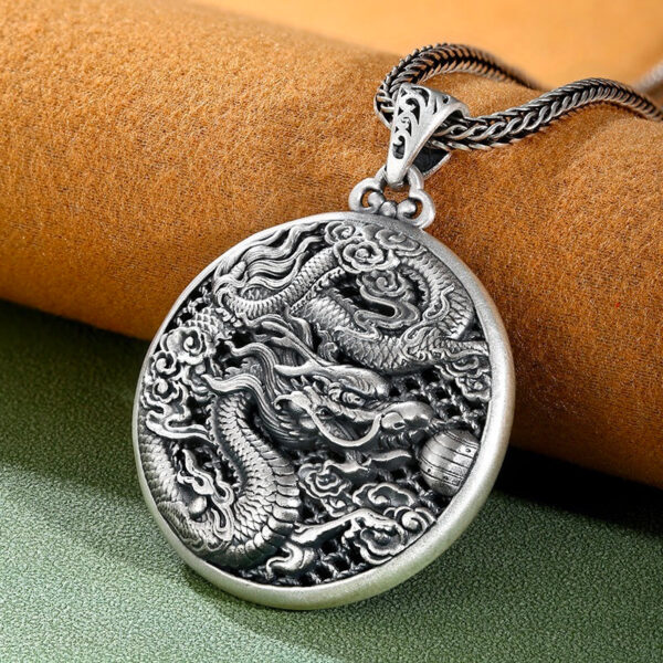 DragonsPlayingwithBeadsWireInlayRoundPendant-SterlingSilver.jpg