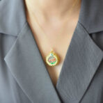 Elegantwomen_slotusflowersachetpendantwithHetianjadeandenamel.jpg