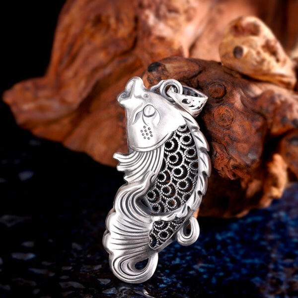 FishJumpHollowPendant.jpg FishJumpHollowPendant.jpg