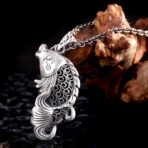 FishJumpHollowPendant-SterlingSilver.jpg