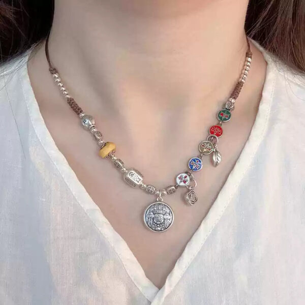 Five_Wealth_Gods_Necklace_in_999_Pure_Silver.jpg