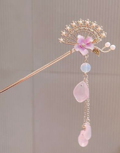 Pinkflowerfanshaped2pinkbeadtasselhairpin.jpg Pinkflowerfanshaped2pinkbeadtasselhairpin.jpg