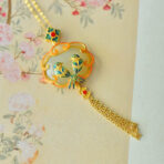 RetropalacestylesilvermagpiecharmwithHetianjadeandenamel.jpg