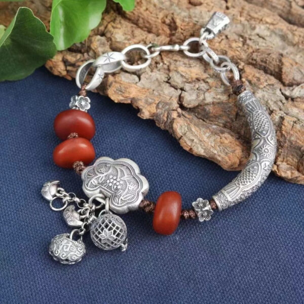 Ruyi_Lock_Bent_Tube_Chicken_Fat_Red_Amber_Beads_Fortune_Bracelet.jpg