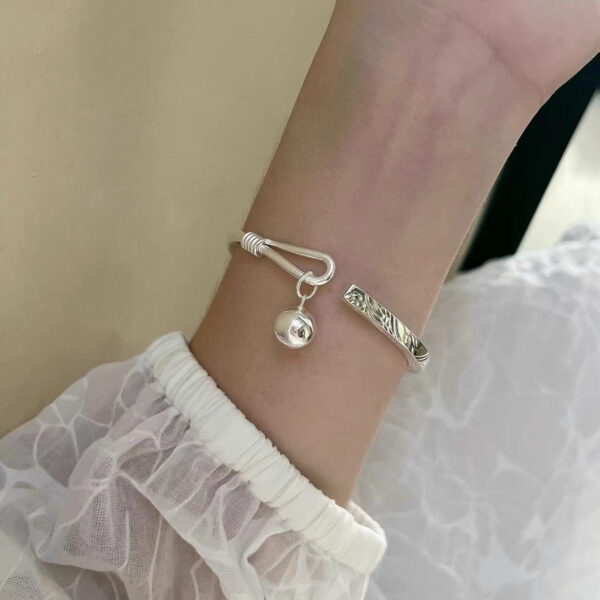 SilverPhoenixDailyOpeningBracelet.jpg