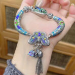 SterlingSilverButterflyFlowerBirdElbowBracelet.jpg
