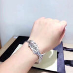 SterlingSilverseedpodofthelotusFishOpenBracelet.jpg