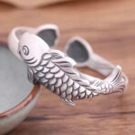 seedpodofthelotusFishOpenBracelet.jpg