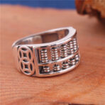 silverChineseCalculatorand4copperRing.jpg